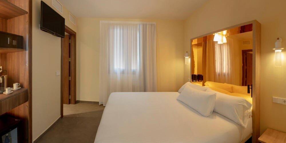 Foto de una habitación de Hotel SH Suite Palace