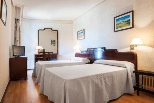 Foto de una habitación de Hotel Alcántara