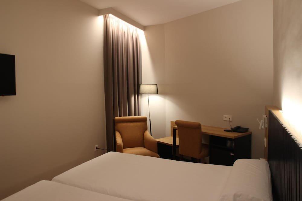 Foto de una habitación de Hotel Alcántara