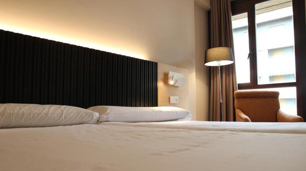 Foto de una habitación de Hotel Alcántara