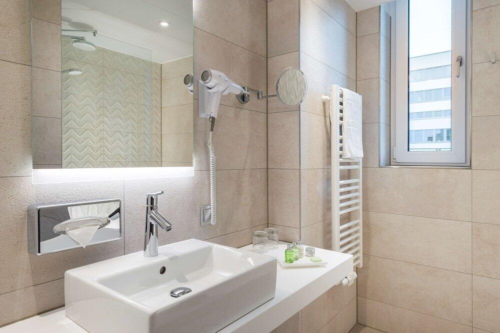 Foto del baño de Hotel NH Hannover
