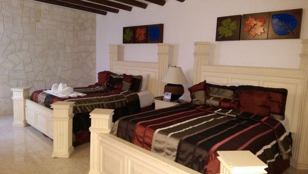 Foto de una habitación de Hotel Ecotel Quinta Regia
