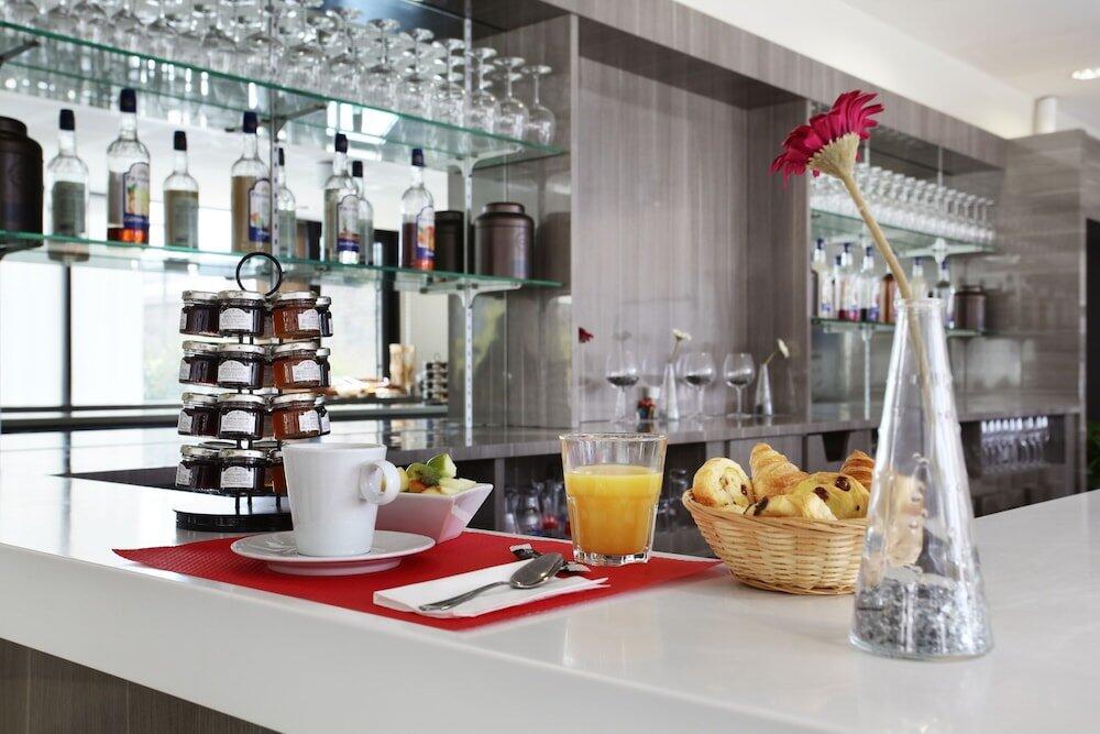 Foto de restauración de Aparthotel Odalys City Lyon Confluence