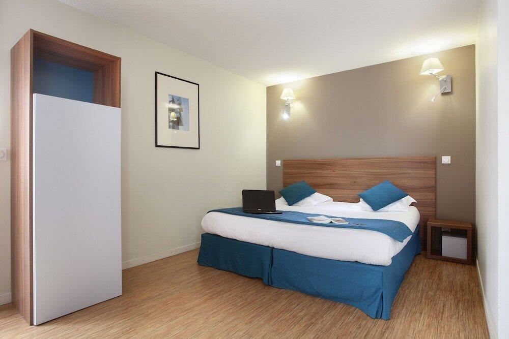 Foto de una habitación de Aparthotel Odalys City Lyon Confluence
