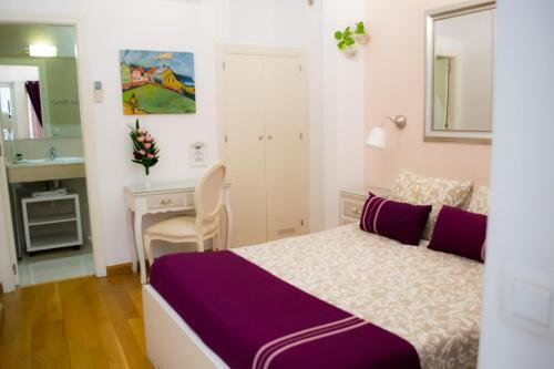 Foto de una habitación de Hotel Un Patio en Santa Cruz