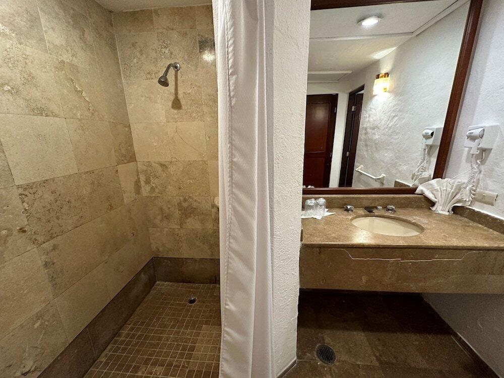 Foto del baño de Hotel Quijote Inn