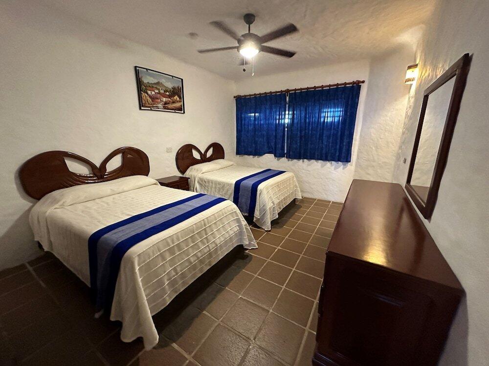 Foto de una habitación de Hotel Quijote Inn