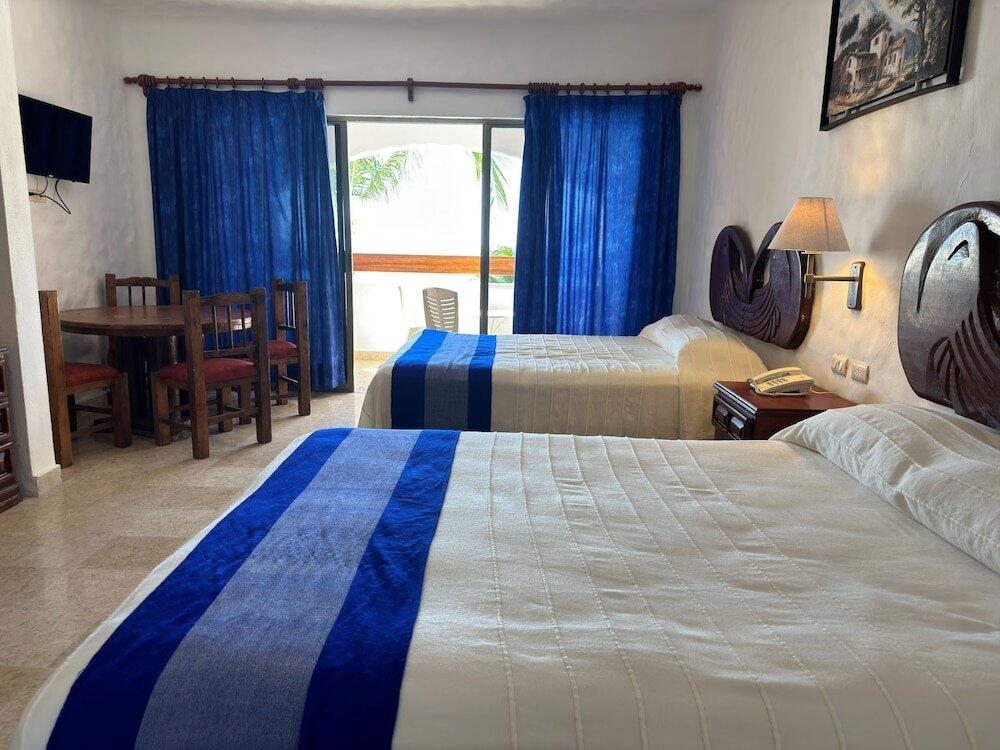 Foto de una habitación de Hotel Quijote Inn
