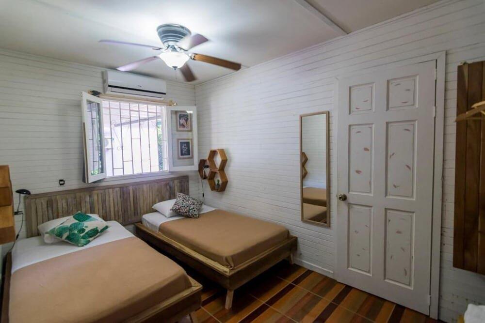 Foto de una habitación de Hotel Selina Puerto Viejo
