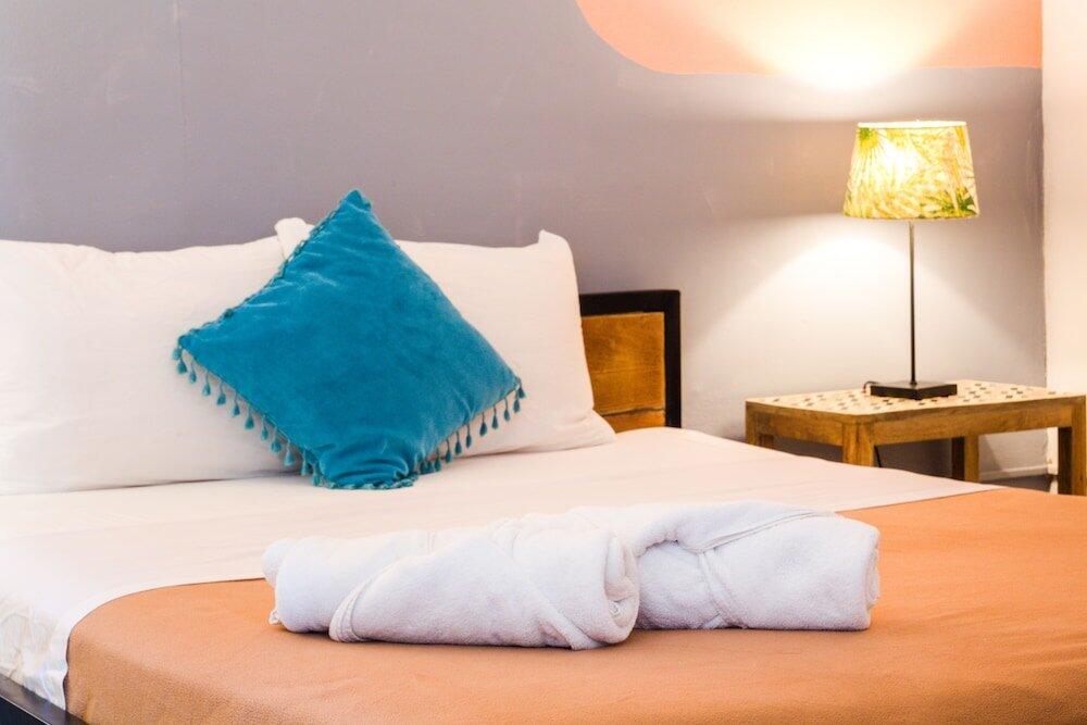 Foto de una habitación de Hotel Selina Puerto Viejo