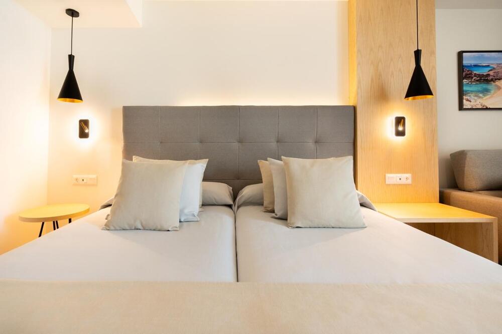 Foto de una habitación de HL Rondo Hotel