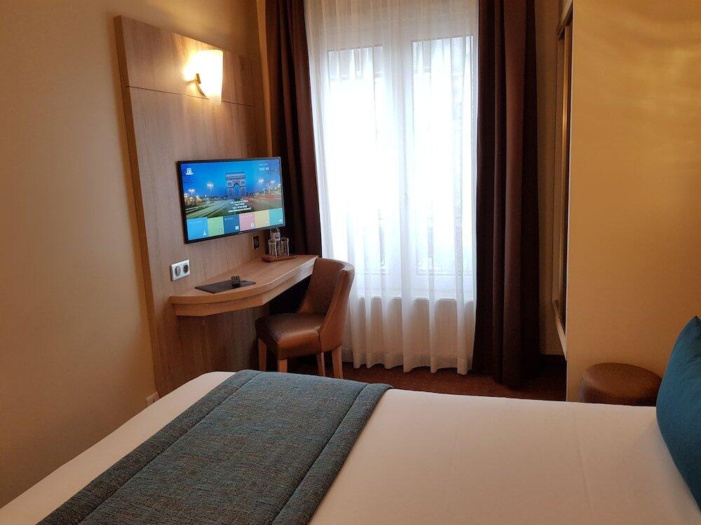 Foto de una habitación de Hotel Champerret Elysees