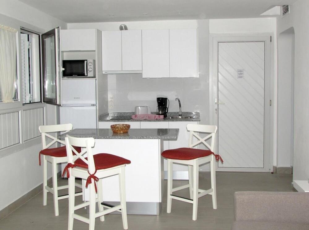 Foto de una habitación de Bungalows Playa Limones