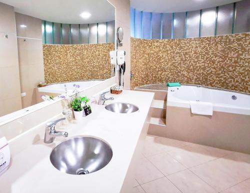 Foto del baño de Quorum Córdoba Hotel, Resort Urbano