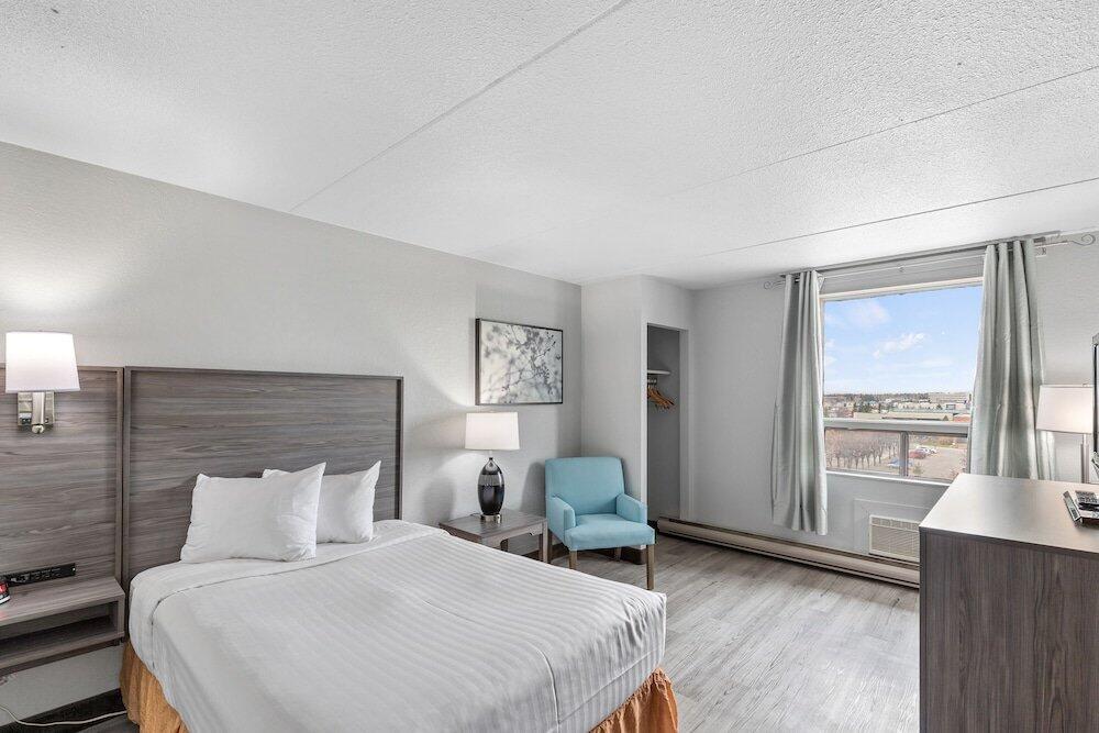 Foto de una habitación de Emerald Hotel &amp;amp; Suites