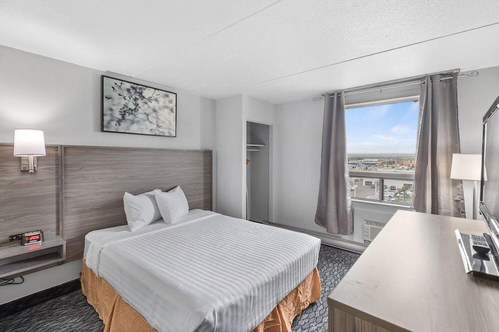 Foto de una habitación de Emerald Hotel &amp;amp; Suites