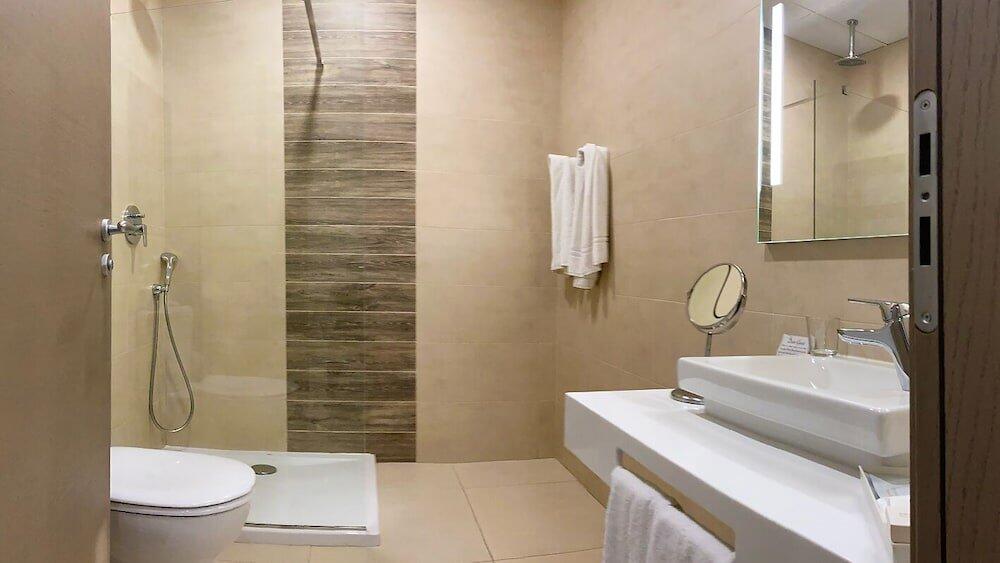 Foto del baño de Hotel Kennedy Nova