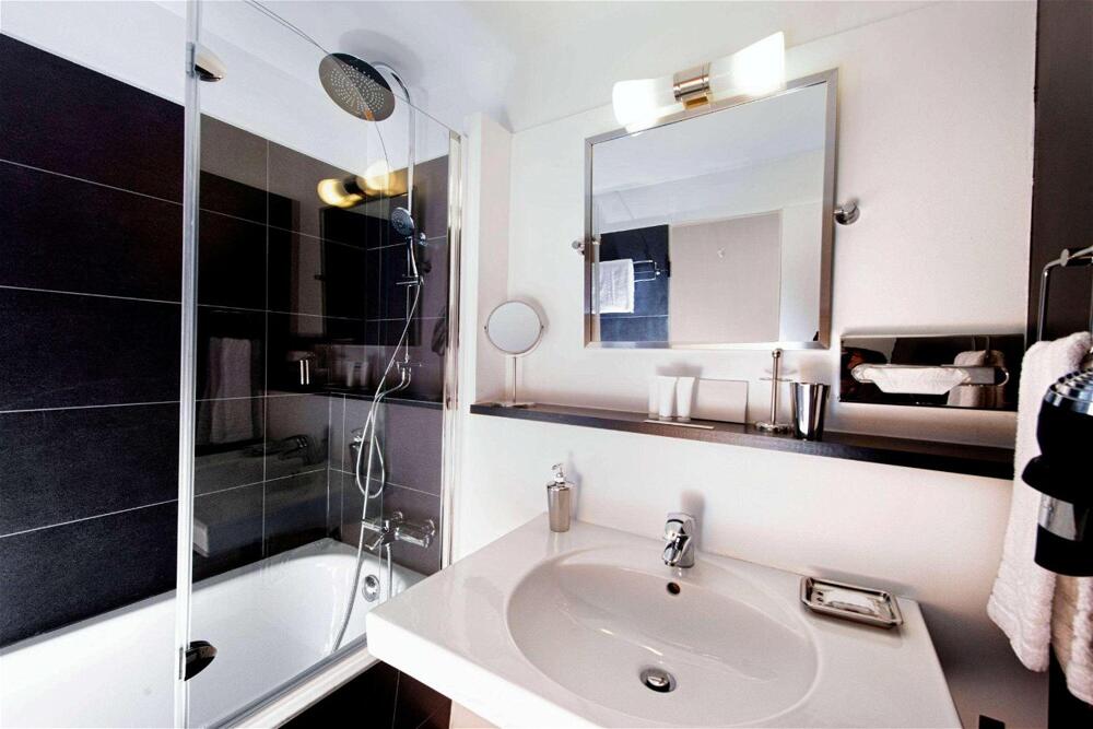 Foto del baño de Hotel Wyndham Hannover Atrium