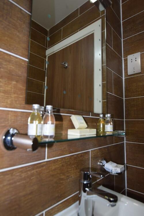 Foto del baño de Lucky 8 Hotel