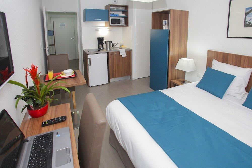 Foto de una habitación de Aparthotel Odalys City Orléans Saint Jean