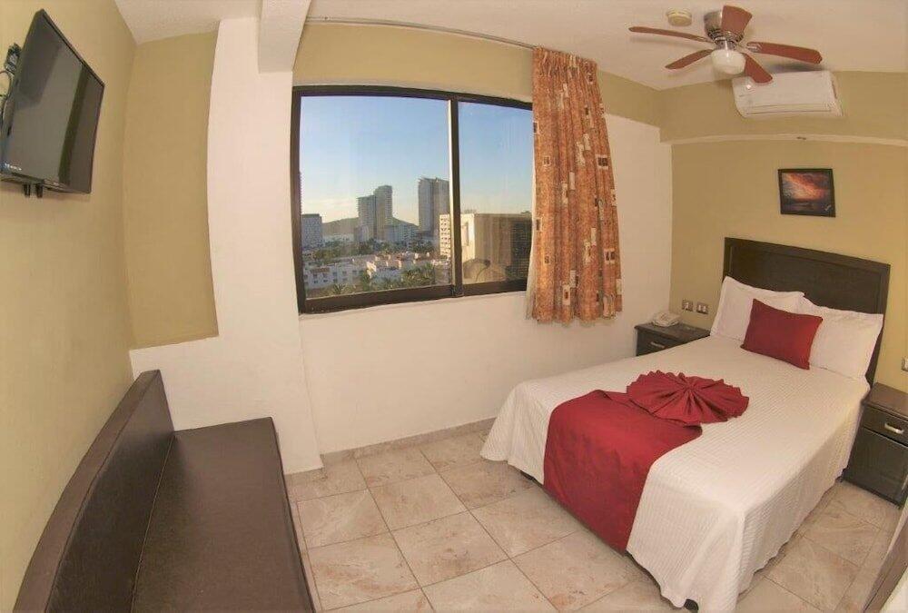 Foto de una habitación de Hotel Playa Bonita