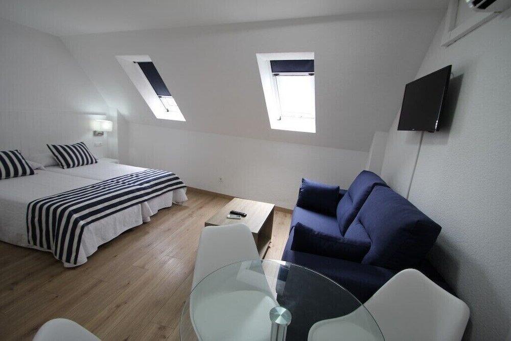 Foto de una habitación de Apartamentos La Mar