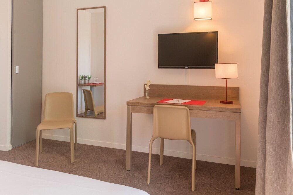 Foto de una habitación de Appart&amp;#039;City Confort Cherbourg