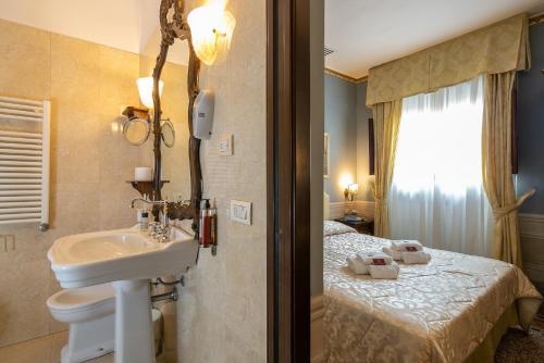 Foto de una habitación de I Portici Hotel - Residenza D&amp;#039;Epoca