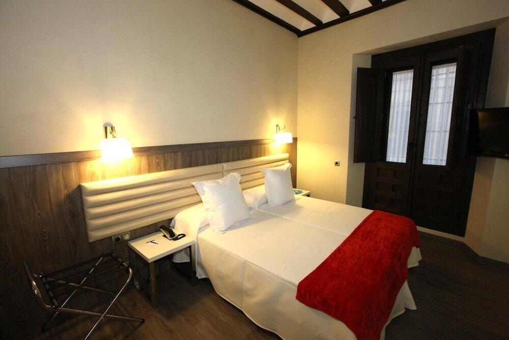 Foto de una habitación de Evenia Alcalá Boutique Hotel