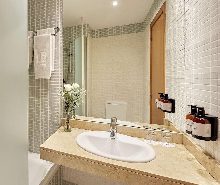 Foto del baño de Hotel NH Valencia Las Ciencias