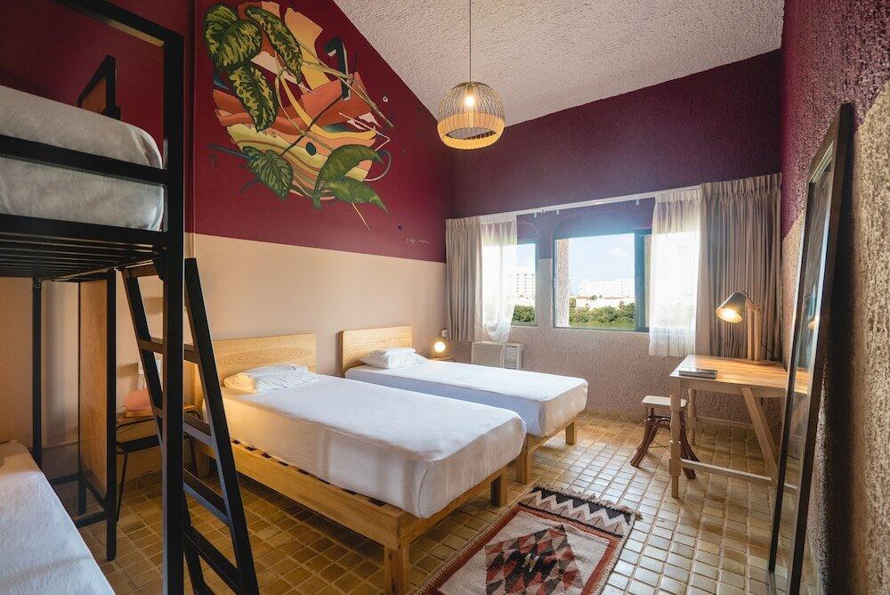 Foto de una habitación de Selina Cancun Laguna Hotel Zone