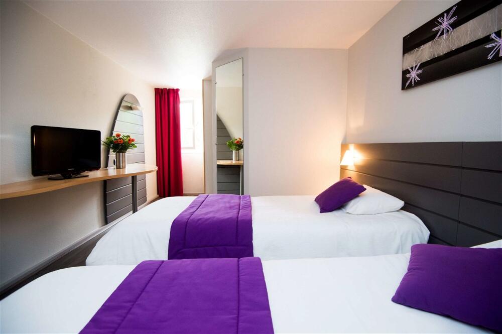 Foto de una habitación de Kyriad Orthez