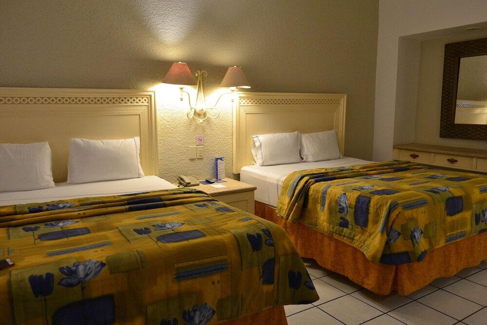 Foto de una habitación de Hotel María Isabel Colima