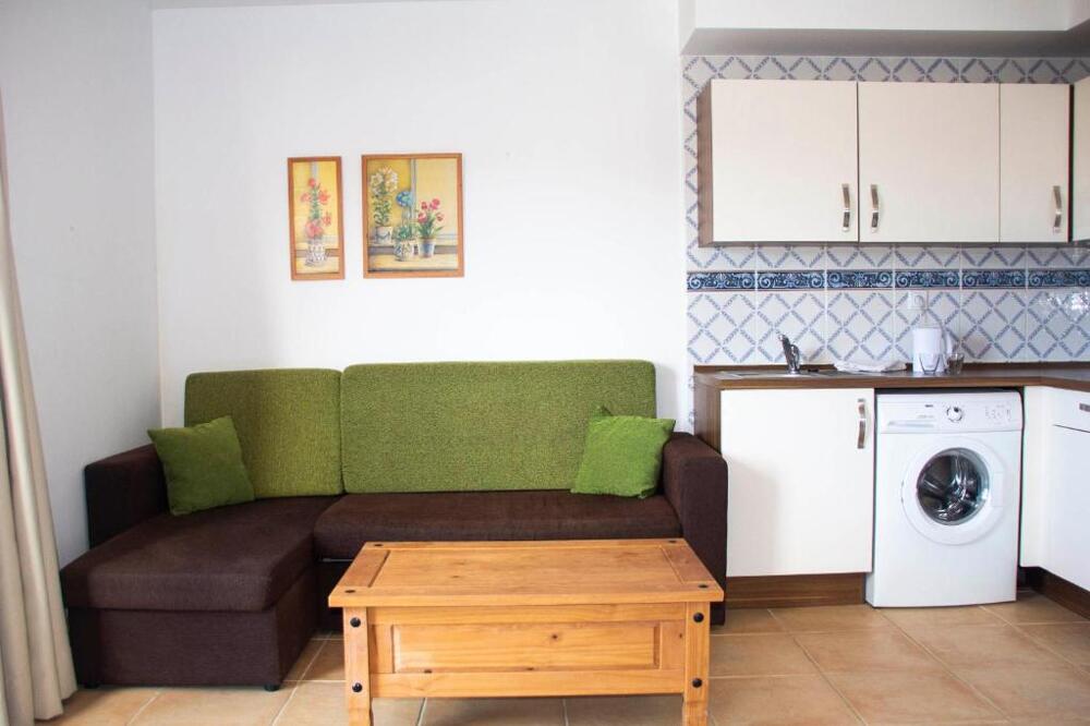 Foto de una habitación de Apartamentos TAO El Cotillo