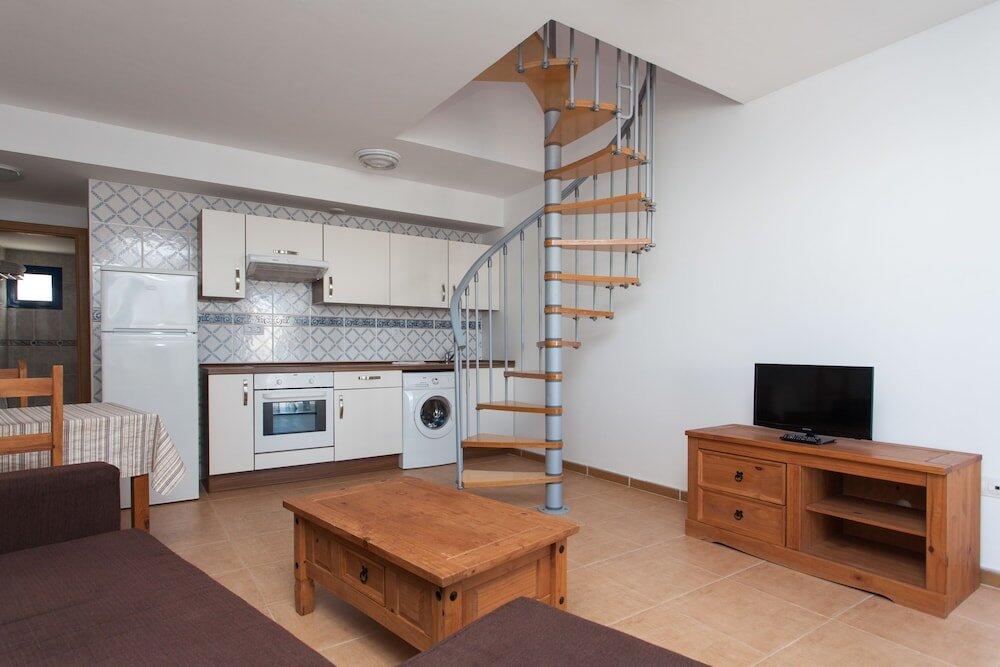 Foto de una habitación de Apartamentos TAO El Cotillo
