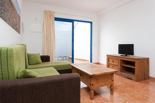 Foto de una habitación de Apartamentos TAO El Cotillo