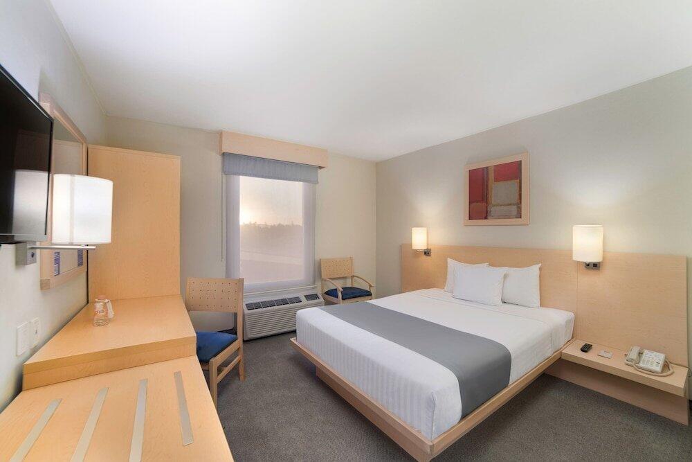 Foto de una habitación de Hotel City Express Tula