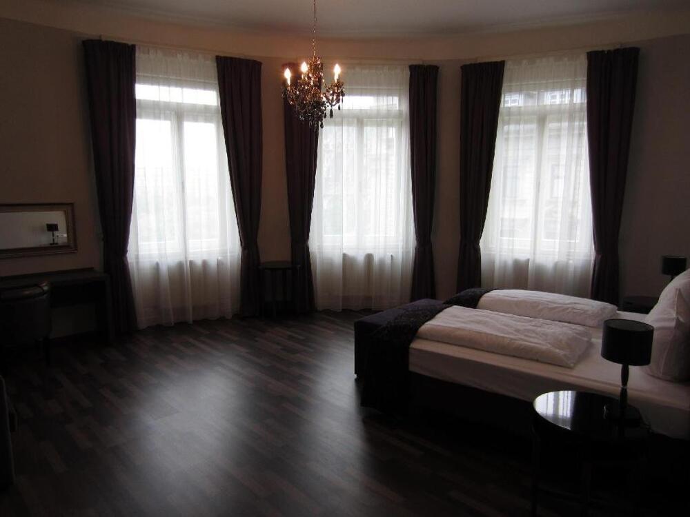 Foto de una habitación de Hotel Pension Baron am Schottentor