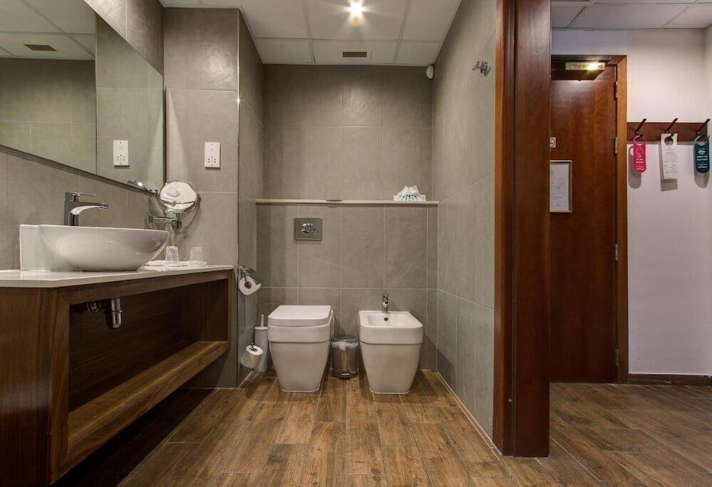 Foto del baño de Vivaldi Hotel