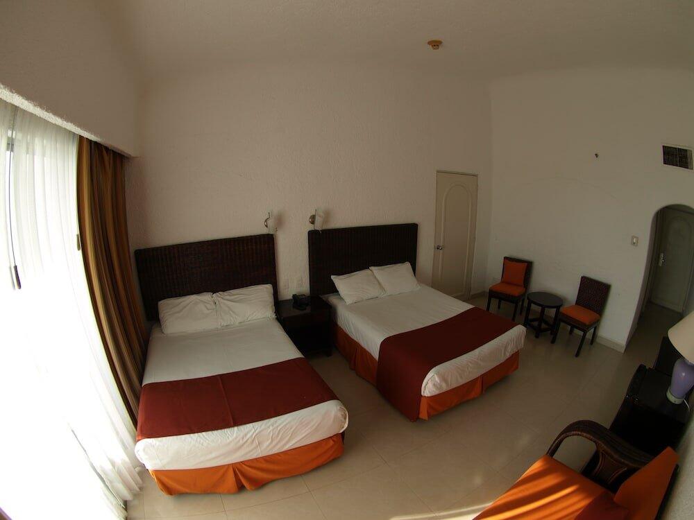 Foto de una habitación de Hotel Sierra Mar All Inclusive at Tesoro