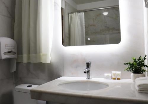Foto del baño de Inkari Suites Hotel