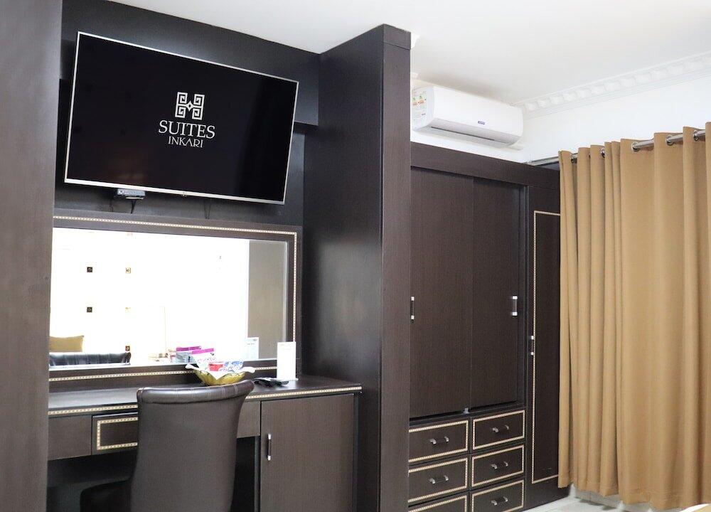 Foto de una habitación de Inkari Suites Hotel