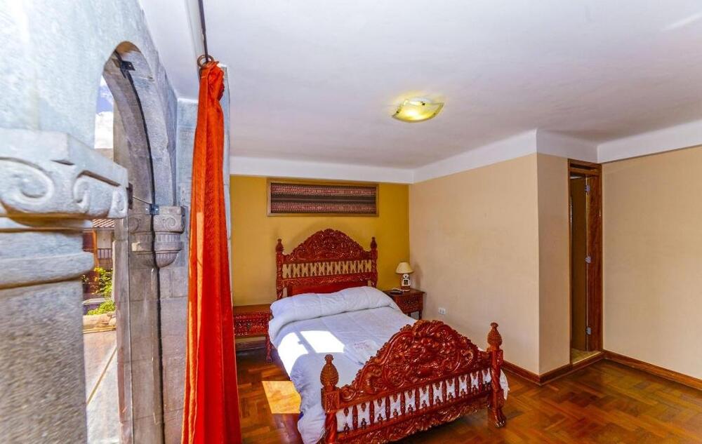 Foto de una habitación de Fuente de Agua Hotel