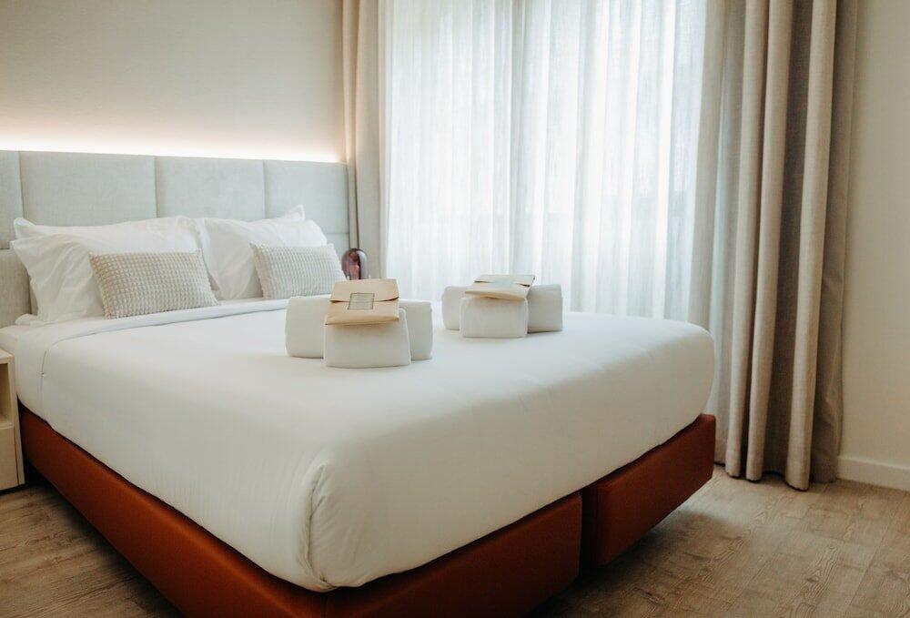 Foto de una habitación de Next Level Premium Hotels