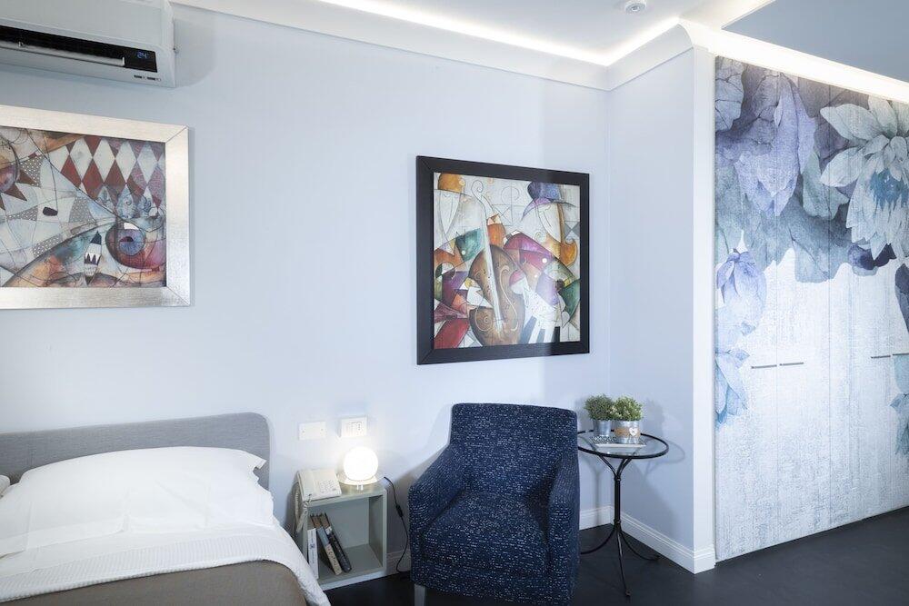 Foto de una habitación de Apartamentos Quadra Key Easy Home In Florence