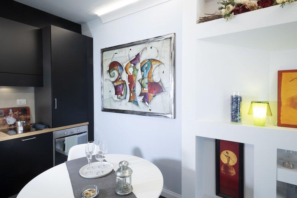 Foto de una habitación de Apartamentos Quadra Key Easy Home In Florence