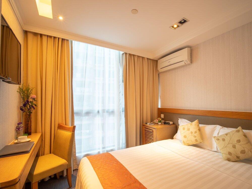 Foto de una habitación de Hotel Bishop Lei International House