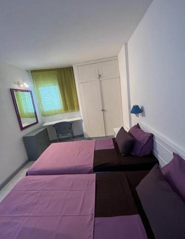 Foto de una habitación de Apart Hotel Ponderosa