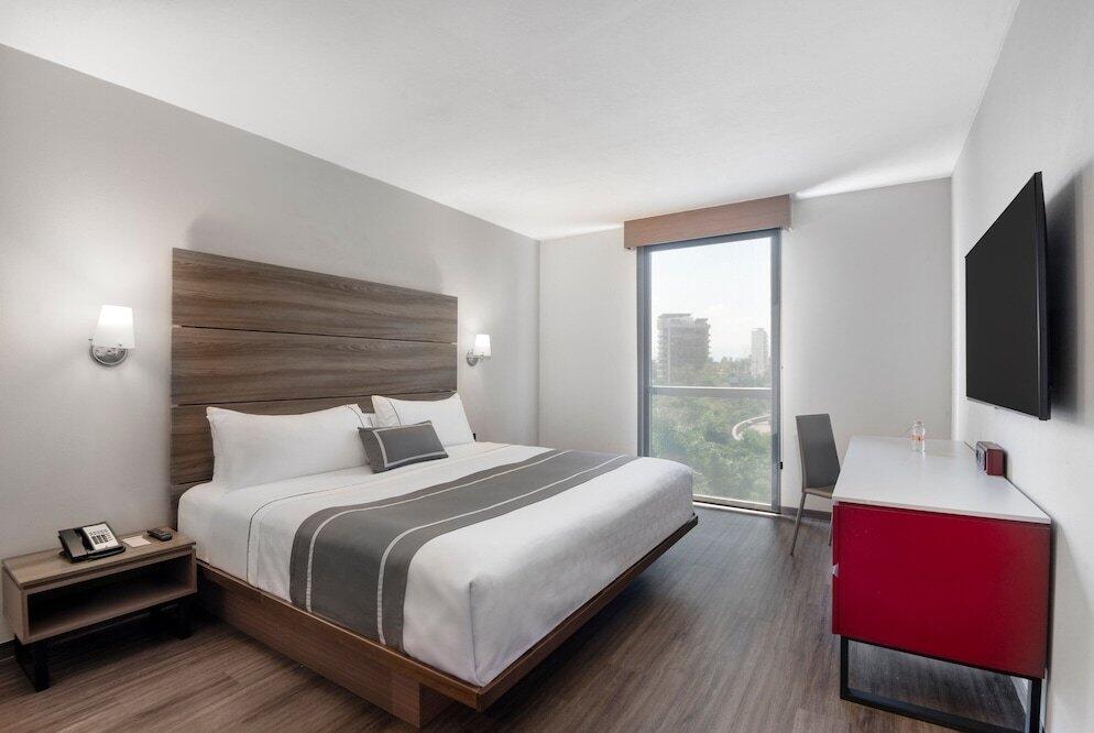Foto de una habitación de Hotel City Express Plus Insurgentes Sur
