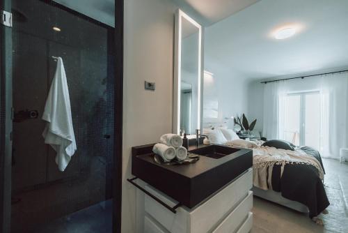 Foto del baño de Mykonos Ammos Hotel - Small Luxury Hotels of the World